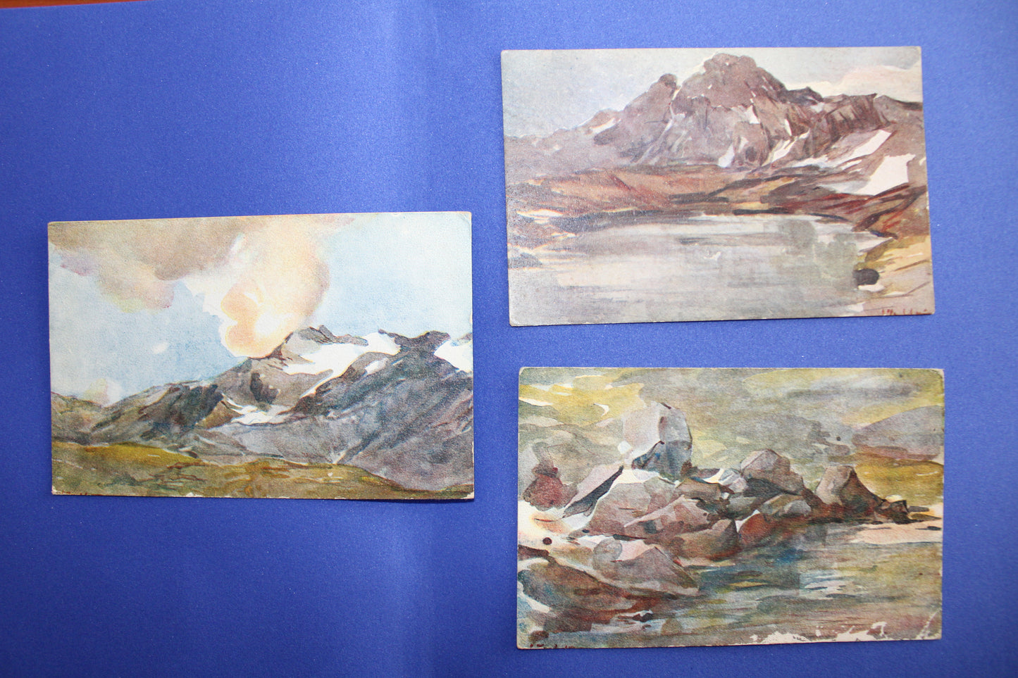 Tris di cartoline raffiguranti panorami montuosi